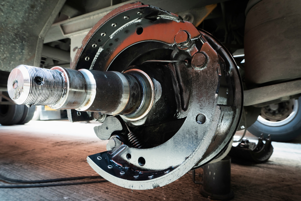 close up of brake pads on large truck